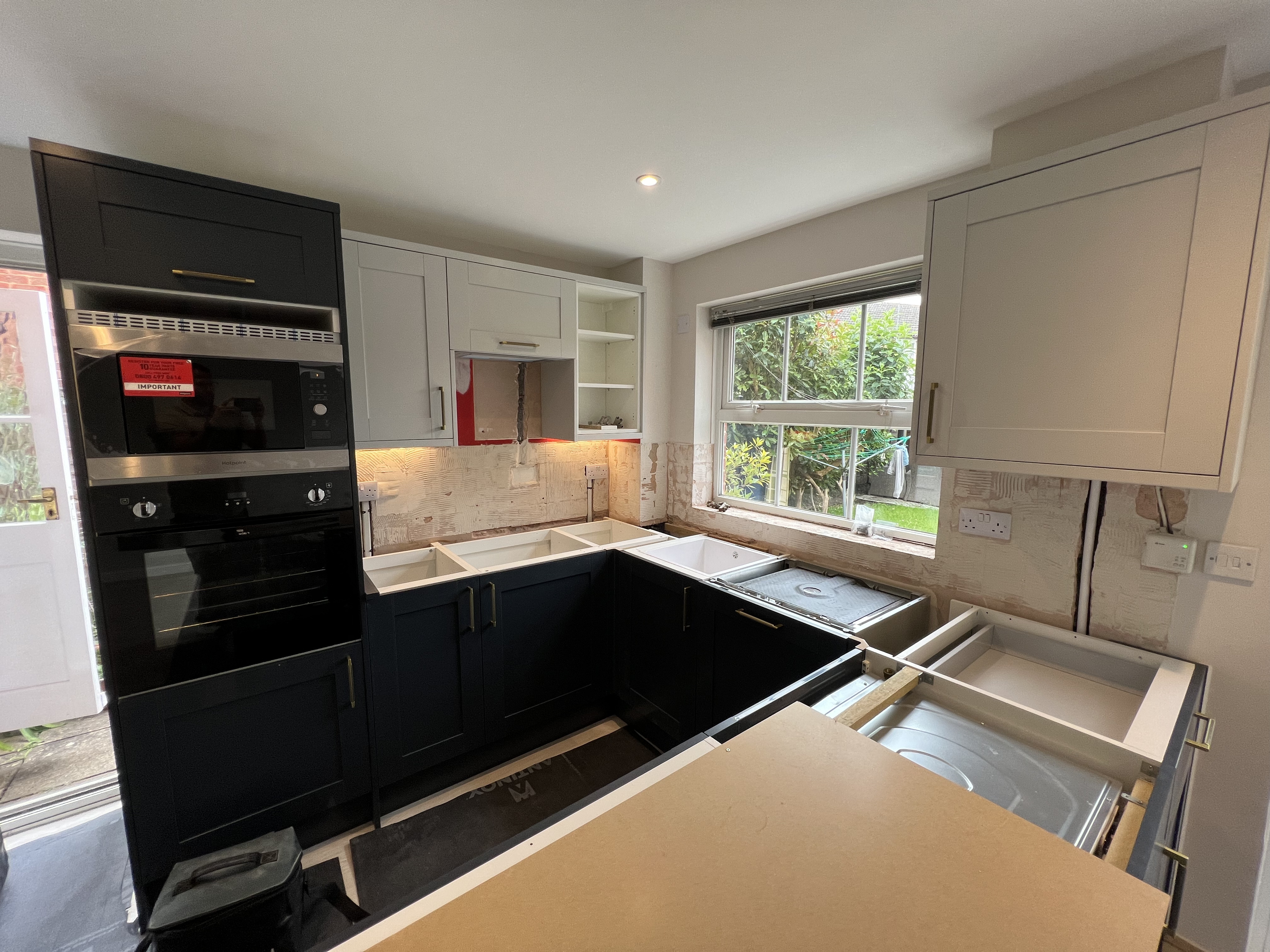 Modern kitchen with new lighting and sockets following a full rewire