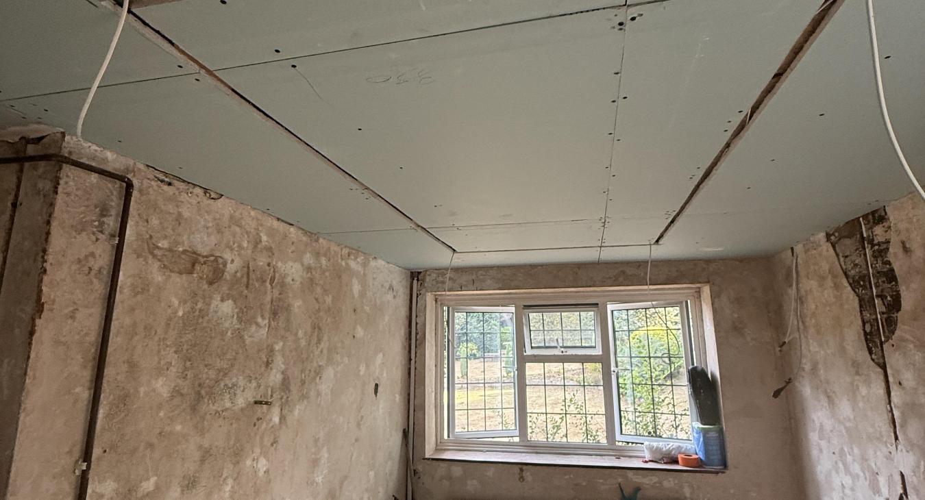 Plaster-In LED Profile Lighting for a Low-Ceiling Utility Room in Esher